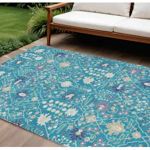 Photo of Teal Blue Purple And Ivory Oriental Washable Indoor Outdoor Area Rug
