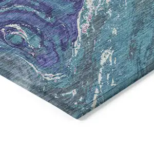 Photo of Teal Blue Purple And Pink Abstract Washable Indoor Outdoor Area Rug