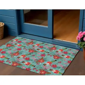Photo of Teal Blue Red Black Pink And Brown Floral Washable Indoor Outdoor Area Rug