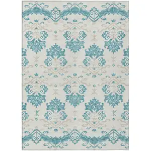 Photo of Teal Blue Silver And Gray Oriental Washable Indoor Outdoor Area Rug
