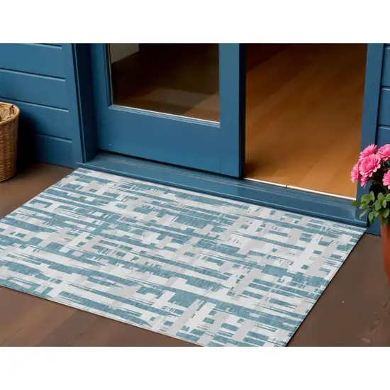 Teal Blue Silver And Ivory Striped Washable Indoor Outdoor Area Rug Photo 2