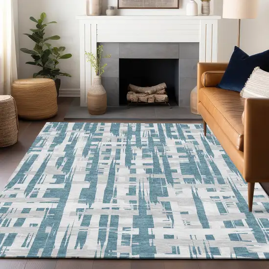 Teal Blue Silver And Ivory Striped Washable Indoor Outdoor Area Rug Photo 6
