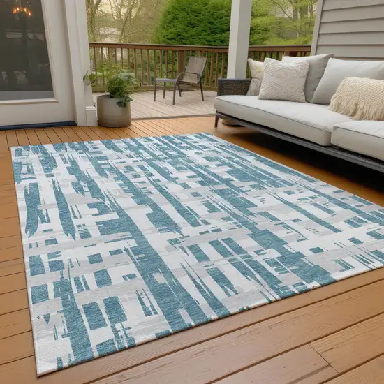 Teal Blue Silver And Ivory Striped Washable Indoor Outdoor Area Rug Photo 8