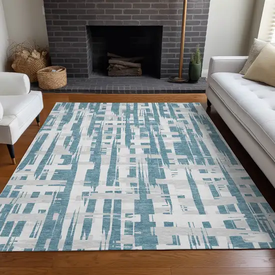 Teal Blue Silver And Ivory Striped Washable Indoor Outdoor Area Rug Photo 7