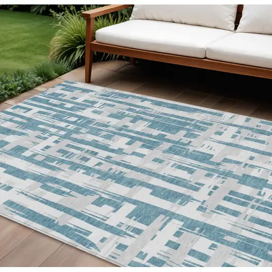Teal Blue Silver And Ivory Striped Washable Indoor Outdoor Area Rug Photo 2