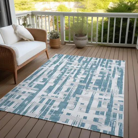 Teal Blue Silver And Ivory Striped Washable Indoor Outdoor Area Rug Photo 5