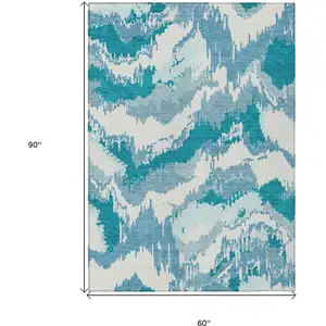 Photo of Teal Blue Sky Blue And Aqua Abstract Washable Indoor Outdoor Area Rug