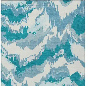 Photo of Teal Blue Sky Blue And Aqua Abstract Washable Indoor Outdoor Area Rug