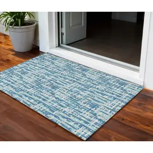Photo of Teal Blue Sky Blue And Ivory Abstract Washable Indoor Outdoor Area Rug