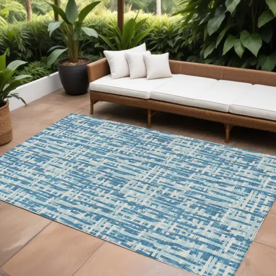 Teal Blue Sky Blue And Ivory Abstract Washable Indoor Outdoor Area Rug Photo 1