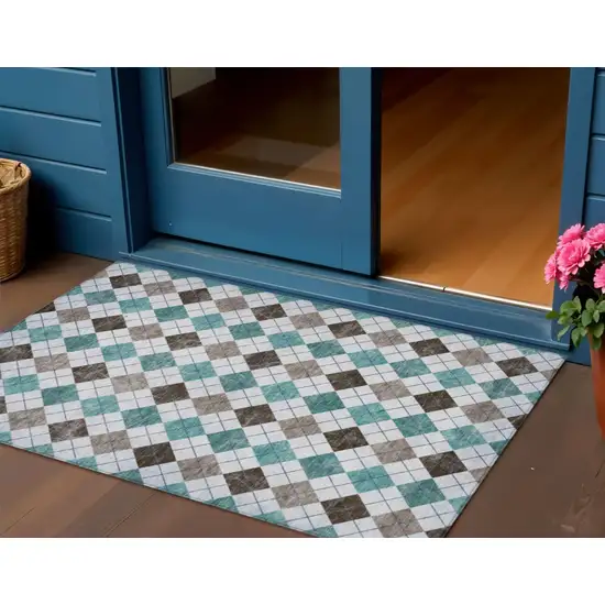 Teal Blue Taupe And Ivory Geometric Washable Indoor Outdoor Area Rug Photo 1