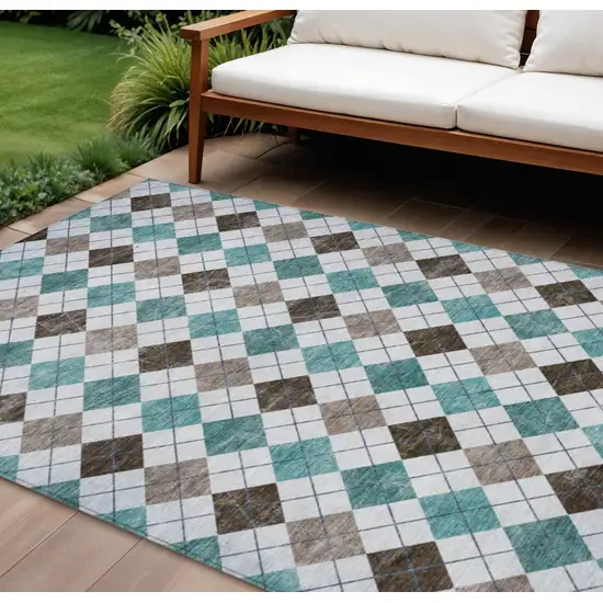 Teal Blue Taupe And Ivory Geometric Washable Indoor Outdoor Area Rug Photo 1