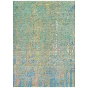Photo of Teal Blue Yellow And Orange Abstract Washable Indoor Outdoor Area Rug