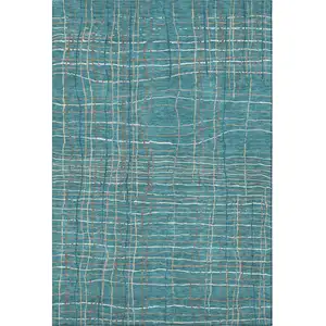 Photo of Teal Brown And Ivory Striped Washable Area Rug With UV Protection