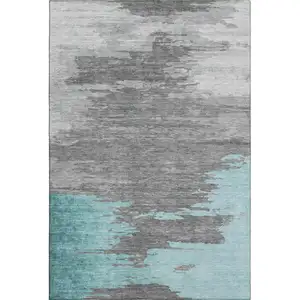 Photo of Teal Charcoal And Gray Abstract Washable Area Rug With UV Protection