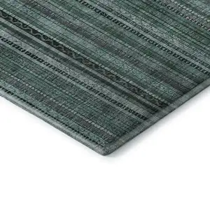 Photo of Teal Charcoal And Gray Striped Washable Area Rug With UV Protection