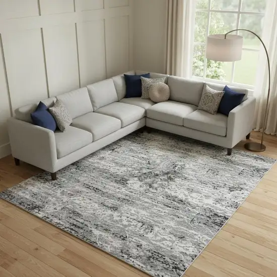 Teal Charcoal And Ivory Abstract Washable Area Rug With UV Protection Photo 1