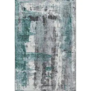Photo of Teal Charcoal And Ivory Abstract Washable Area Rug With UV Protection