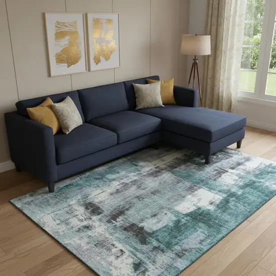 Teal Charcoal And Ivory Abstract Washable Area Rug With UV Protection Photo 1