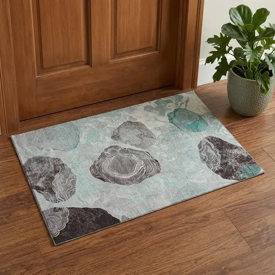 Teal Charcoal And Ivory Geometric Washable Area Rug With UV Protection Photo 1