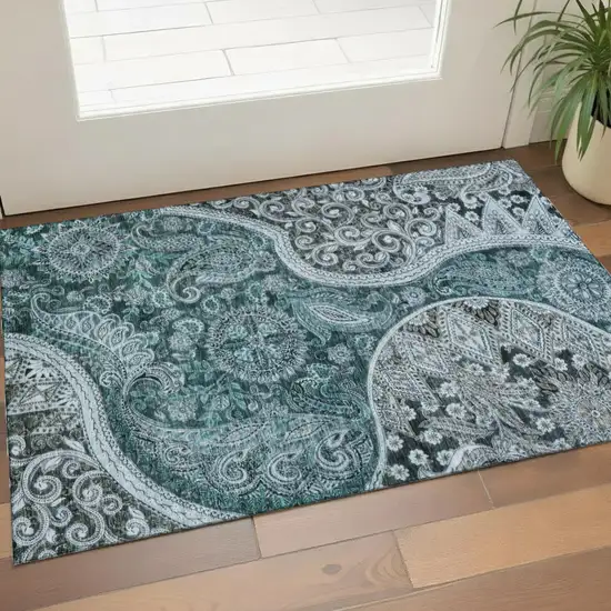 Teal Charcoal And Ivory Paisley Washable Area Rug With UV Protection Photo 1