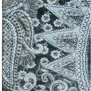 Photo of Teal Charcoal And Ivory Paisley Washable Area Rug With UV Protection
