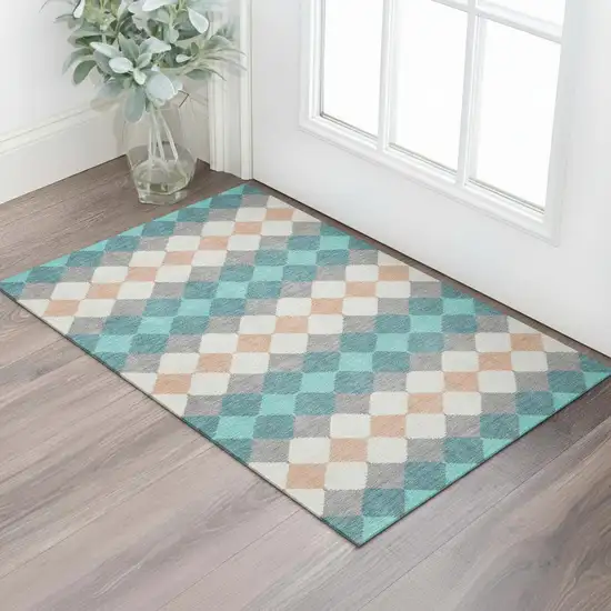 Teal Coral And Ivory Geometric Washable Area Rug With UV Protection Photo 2