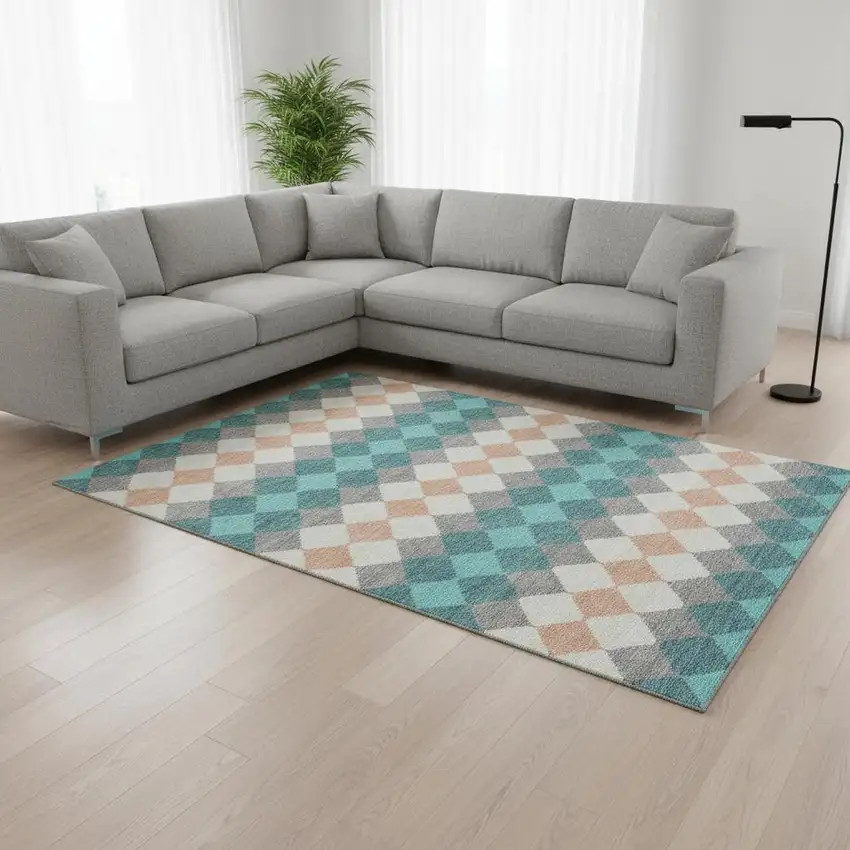 Teal Coral And Ivory Geometric Washable Area Rug With UV Protection Photo 2