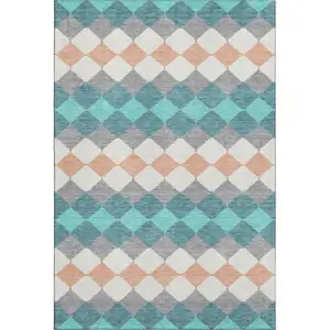 Photo of Teal Coral And Ivory Geometric Washable Area Rug With UV Protection