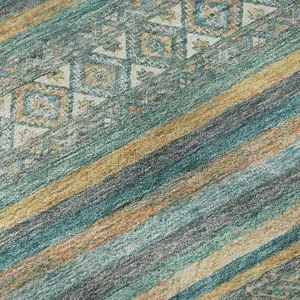 Photo of Teal Gold And Blue Striped Washable Area Rug With UV Protection