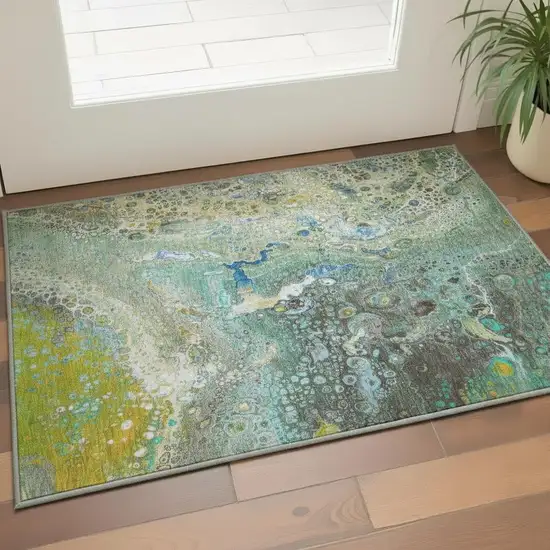 Teal Gold And Gray Abstract Washable Area Rug With UV Protection Photo 2