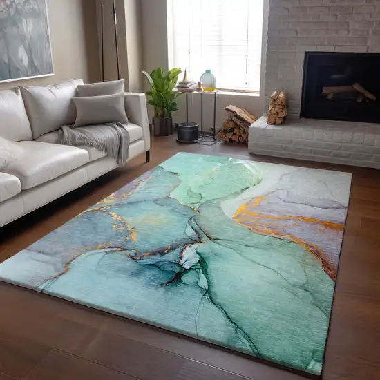 Teal Gold And Ivory Abstract Washable Area Rug With UV Protection Photo 6