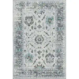 Photo of Teal Gray And Charcoal Oriental Washable Area Rug With UV Protection