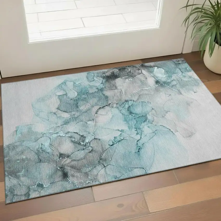 Teal Gray And Ivory Abstract Washable Area Rug With UV Protection Photo 1