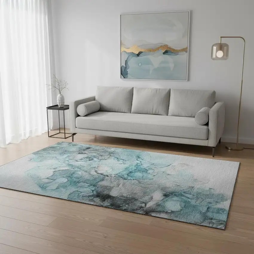 Teal Gray And Ivory Abstract Washable Area Rug With UV Protection Photo 1