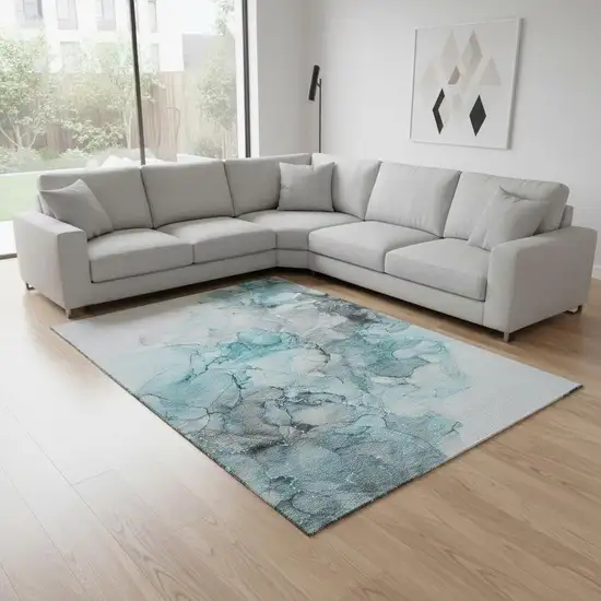 Teal Gray And Ivory Abstract Washable Area Rug With UV Protection Photo 1