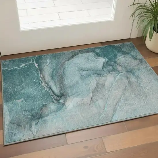 Teal Gray And Ivory Abstract Washable Area Rug With UV Protection Photo 1