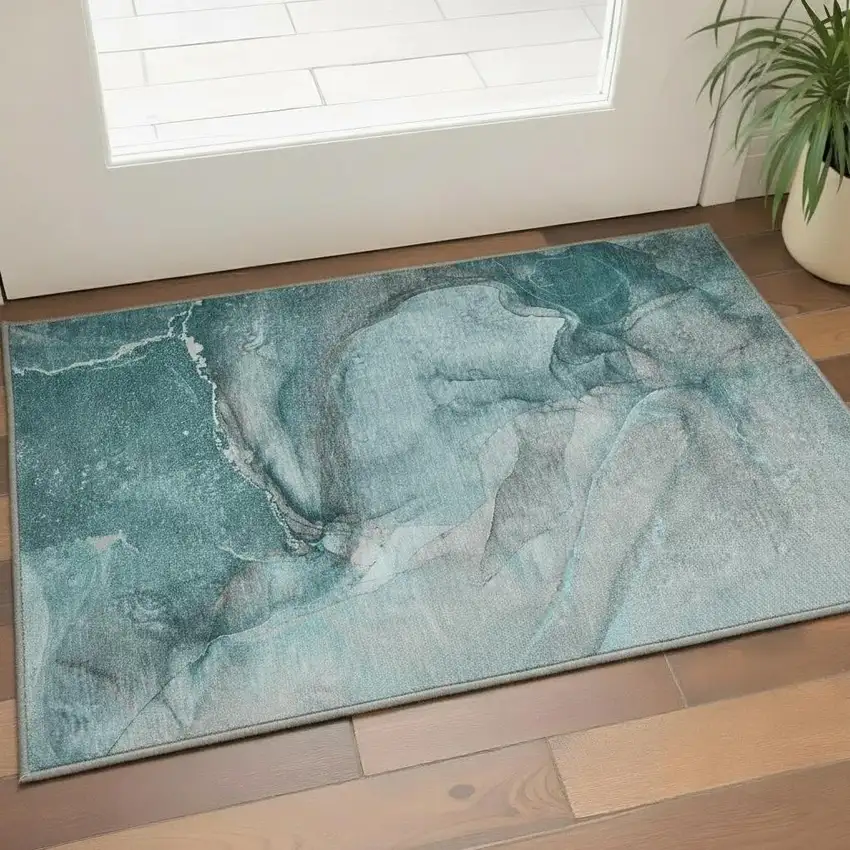 Teal Gray And Ivory Abstract Washable Area Rug With UV Protection Photo 1