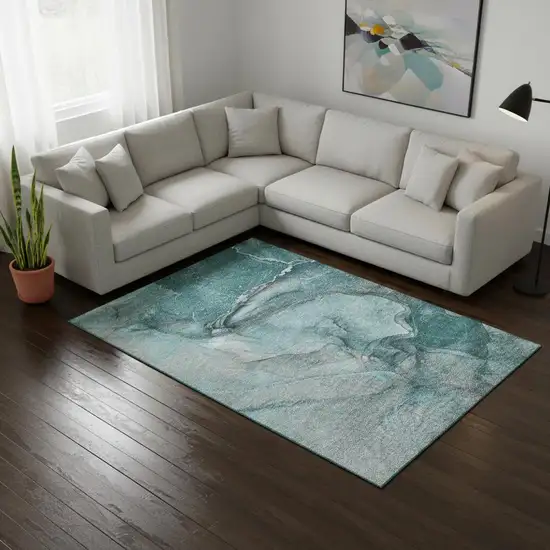 Teal Gray And Ivory Abstract Washable Area Rug With UV Protection Photo 1