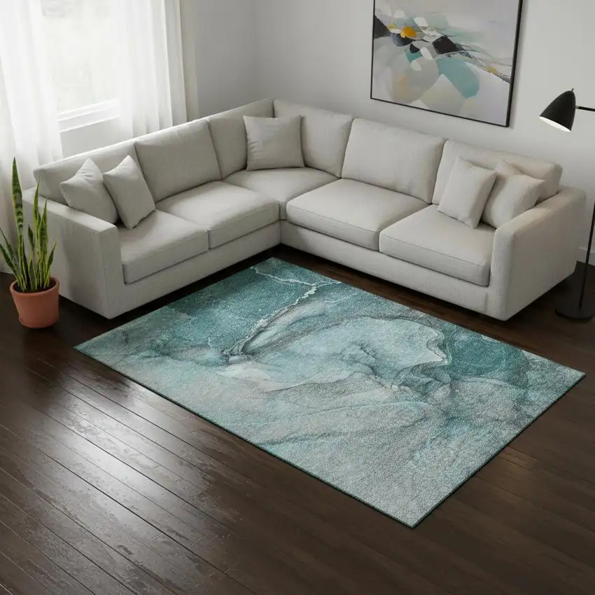 Teal Gray And Ivory Abstract Washable Area Rug With UV Protection Photo 1