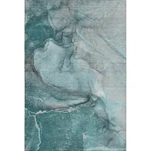 Photo of Teal Gray And Ivory Abstract Washable Area Rug With UV Protection