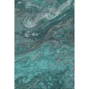 Photo of Teal Gray And Ivory Abstract Washable Area Rug With UV Protection