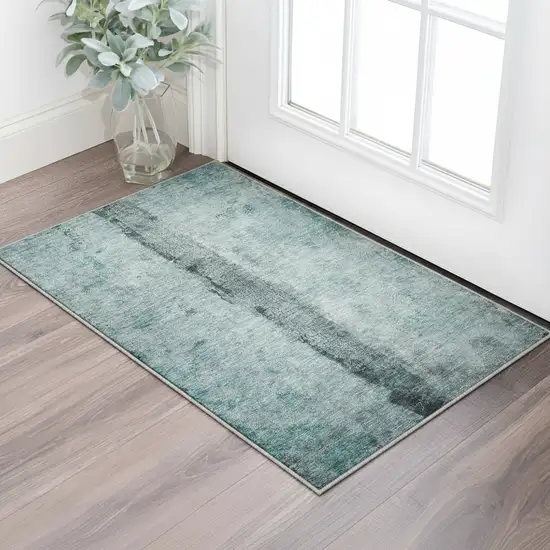 Teal Gray And Ivory Abstract Washable Area Rug With UV Protection Photo 2