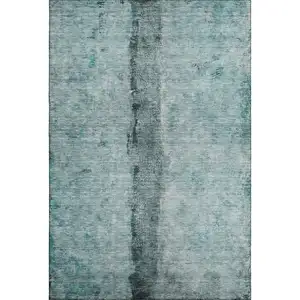 Photo of Teal Gray And Ivory Abstract Washable Area Rug With UV Protection