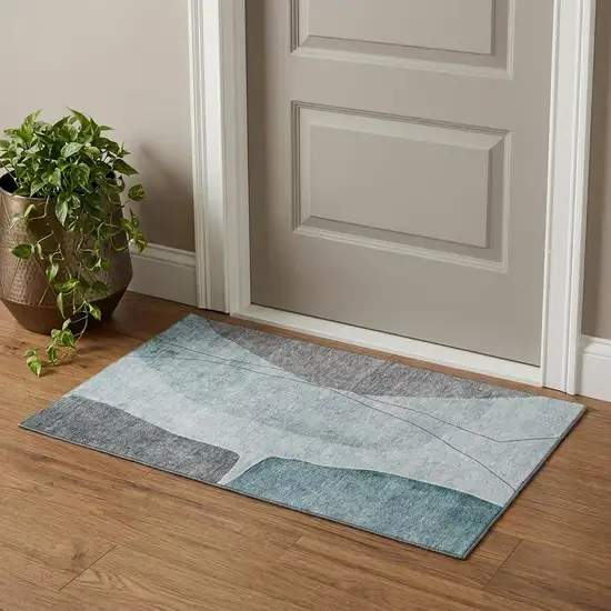 Teal Gray And Ivory Abstract Washable Area Rug With UV Protection Photo 1