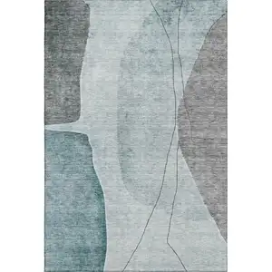 Photo of Teal Gray And Ivory Abstract Washable Area Rug With UV Protection