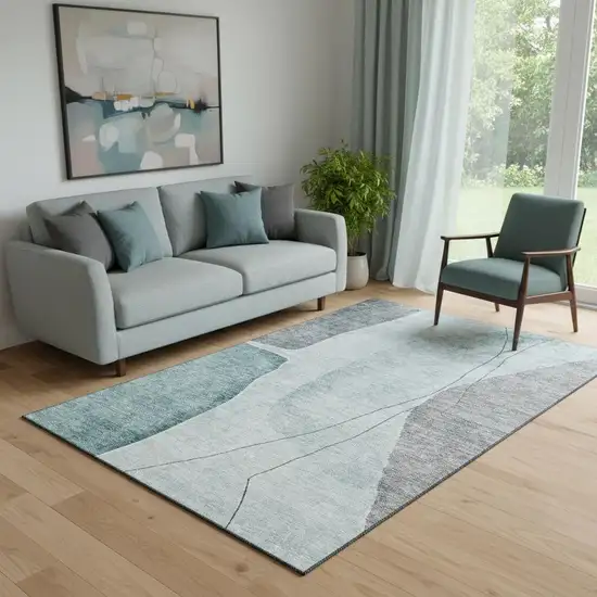 Teal Gray And Ivory Abstract Washable Area Rug With UV Protection Photo 1