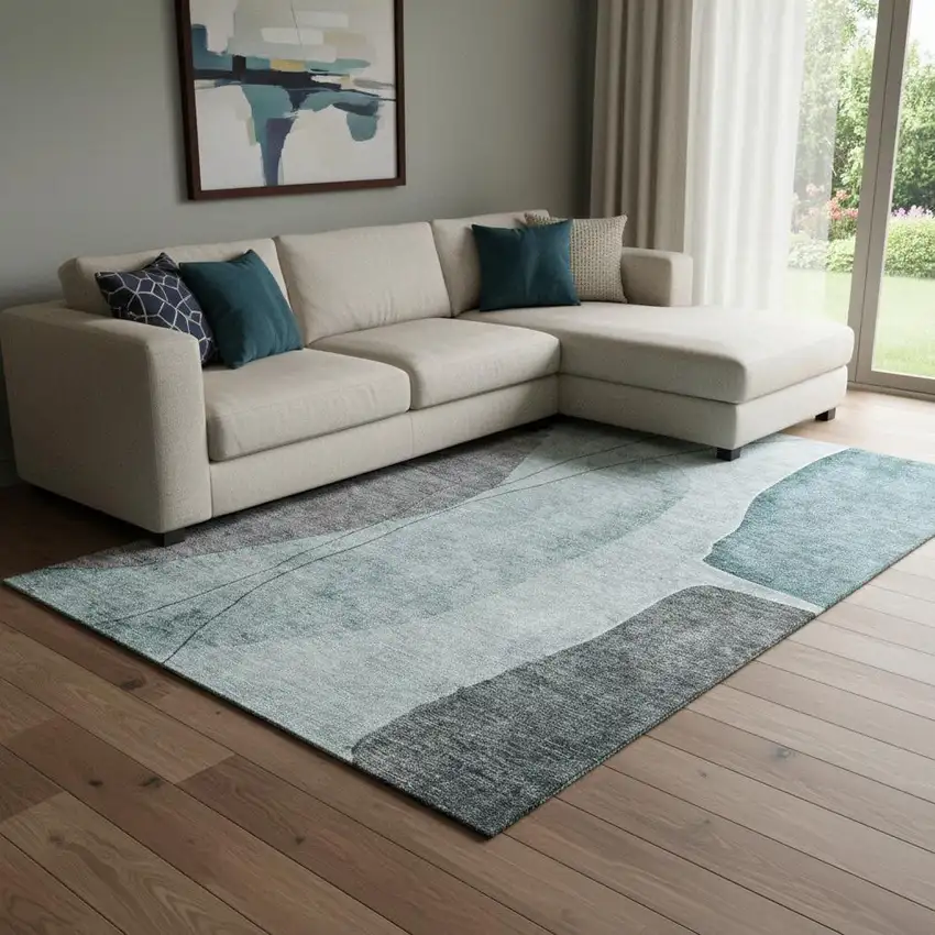 Teal Gray And Ivory Abstract Washable Area Rug With UV Protection Photo 1