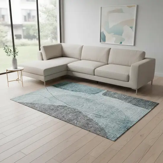 Teal Gray And Ivory Abstract Washable Area Rug With UV Protection Photo 1