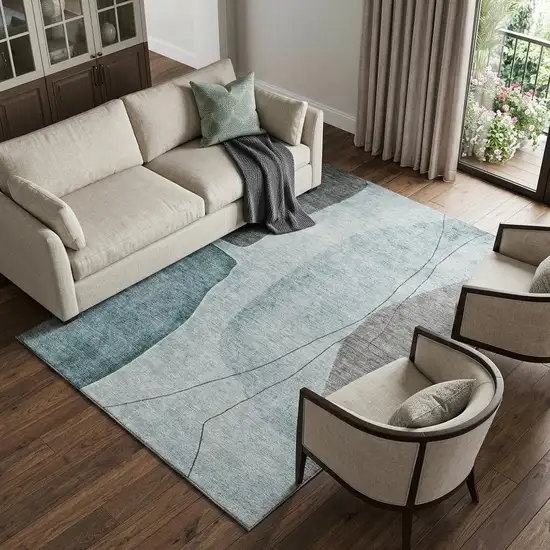 Teal Gray And Ivory Abstract Washable Area Rug With UV Protection Photo 1